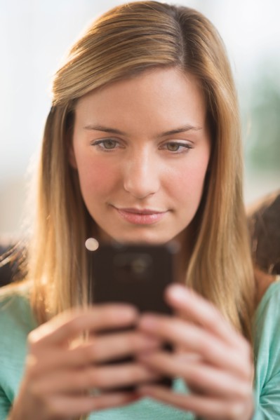Woman using smartphone.