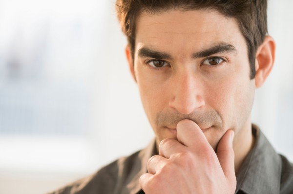 Studio portrait of mid adult man.