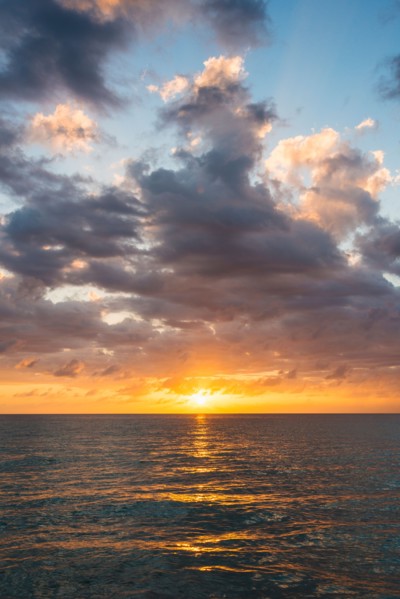 Sun setting over sea. Jamaica.