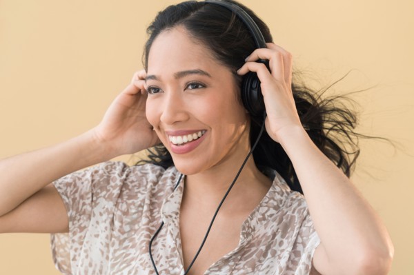 Portrait of young woman in headphones.