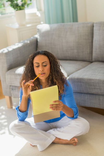 Young woman dealing with home finance.