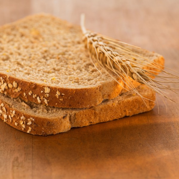 Studio Shot of slices of bread with wheat