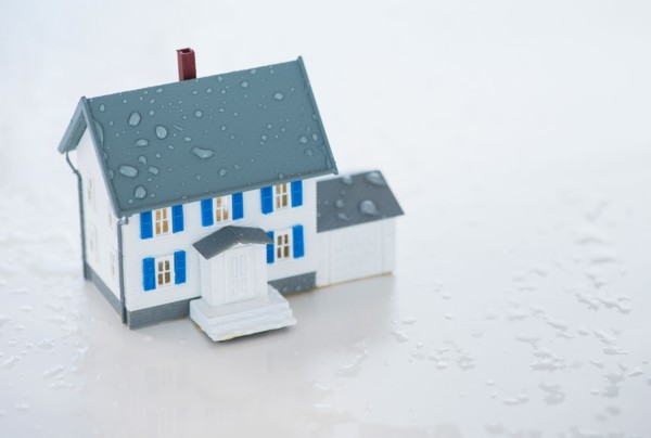 Studio Shot of artificial house during flood