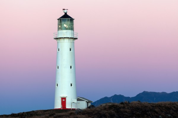 Lighthouse with Taranaki volcano in background