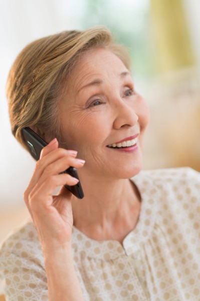 Senior woman talking on phone.