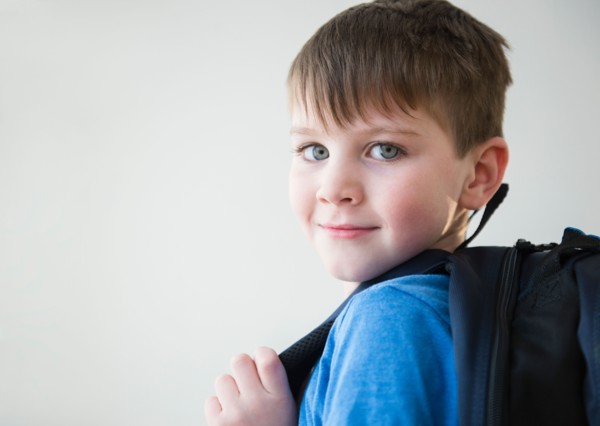 Portrait of boy (4-5) with backpack