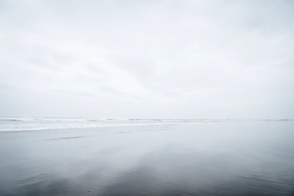 Fog over sandy beach