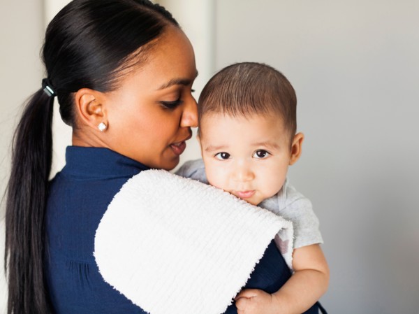 Mother with her baby boy (2-5 months)