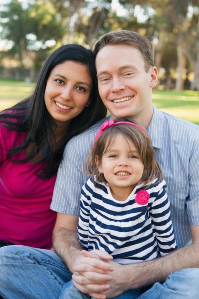 Portrait of happy family in park