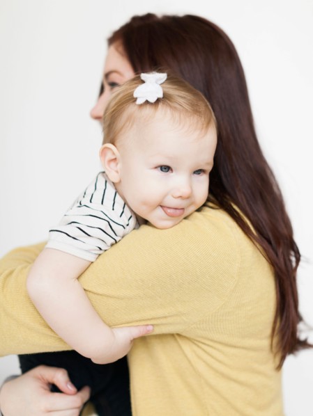 Portrait of mother with daughter (12-17 months)