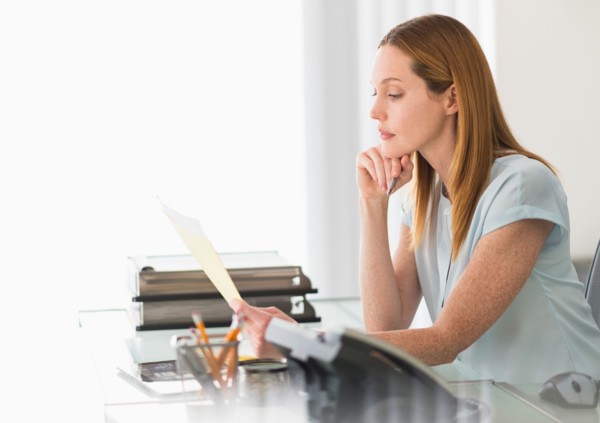 Business woman working in office.