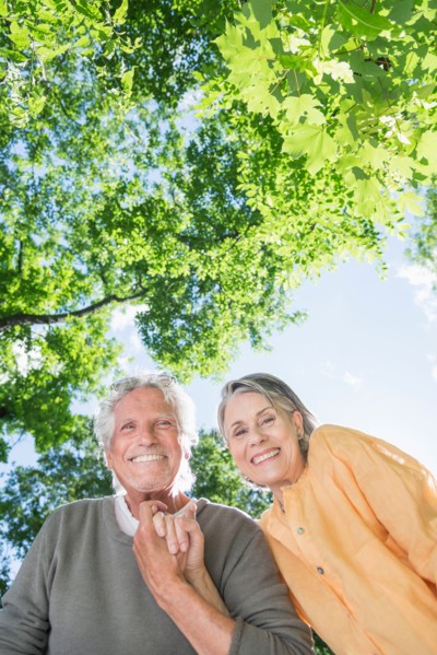 Central Park, New York City. Senior couple under trees.