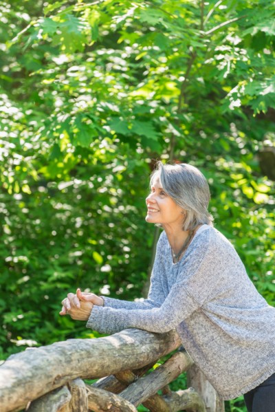 Central Park, New York City. Senior woman relaxing in park.