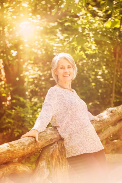 Senior woman relaxing in park.