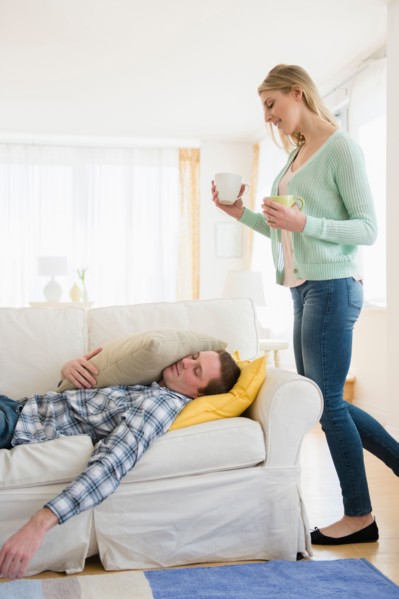 Woman taking car of sick man