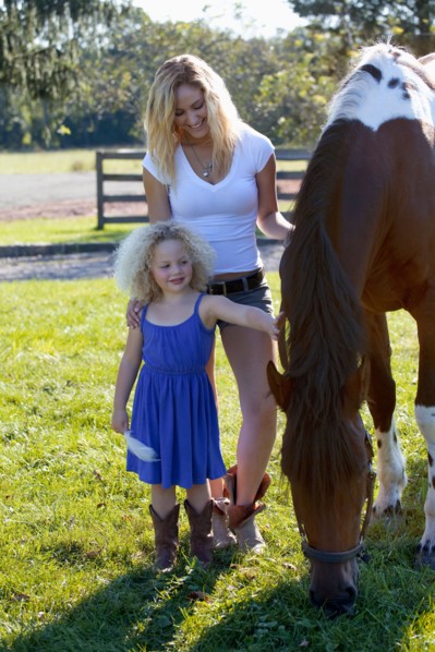 Mother with daughter (4-5) outdoors