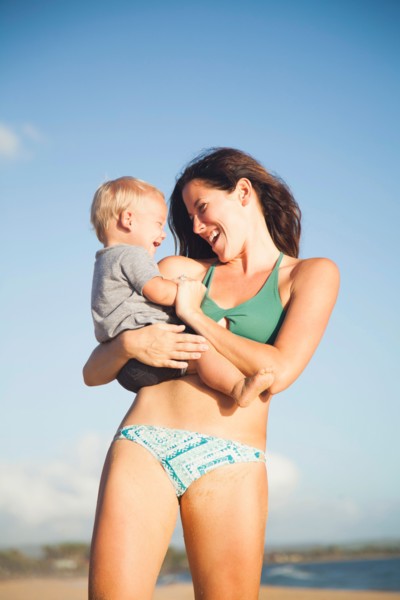 Mother with baby boy (6-11) in arms