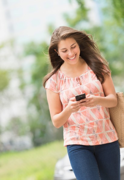 Woman texting on phone.
