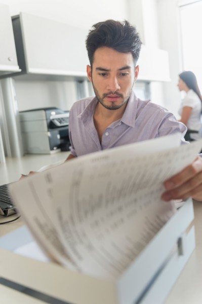 Businessman at work in office.