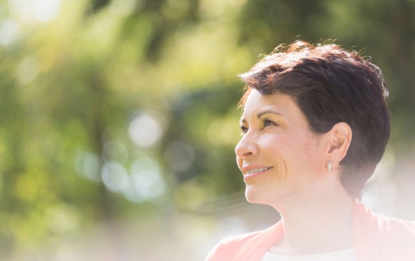 Portrait of mature woman smiling .