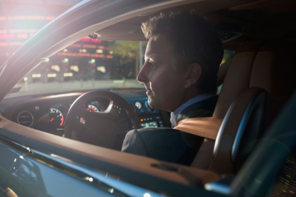 Businessman driving car