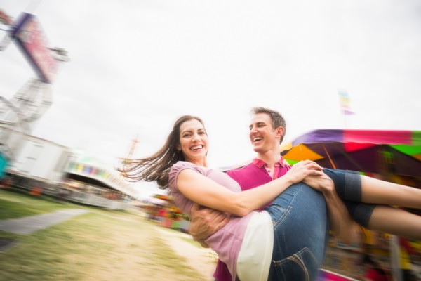 Couple in amusement park
