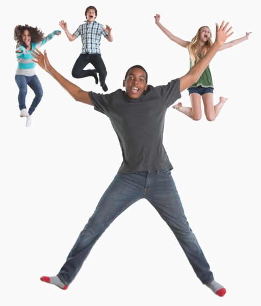 Studio shot of four friends (12-13,14-15) jumping on white background