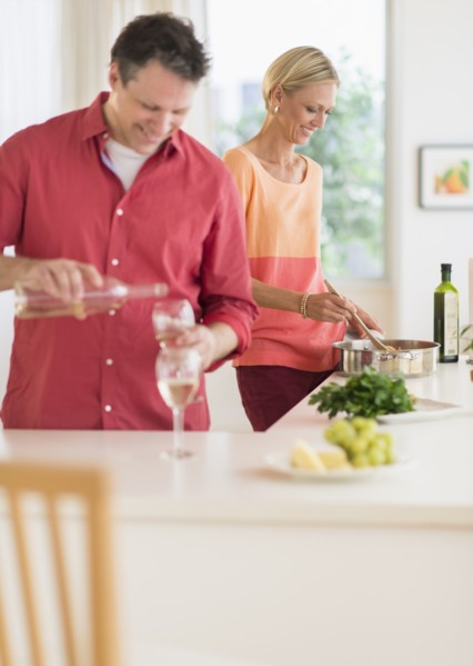 Couple cooking at home.