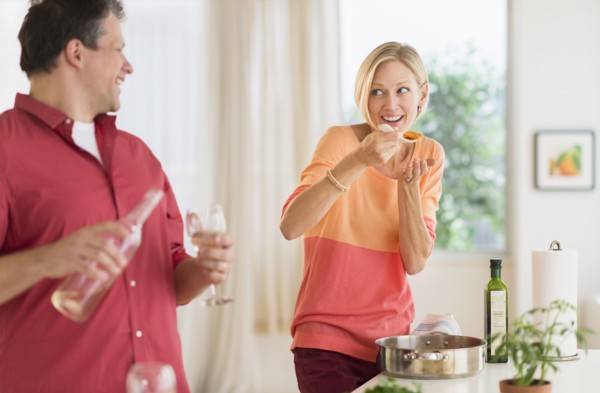 Couple cooking at home.