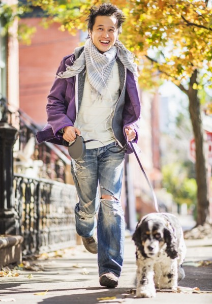 Teenage boy(16-17) walking with dog. USA, New Jersey, Jersey City.
Photo : Daniel Grill