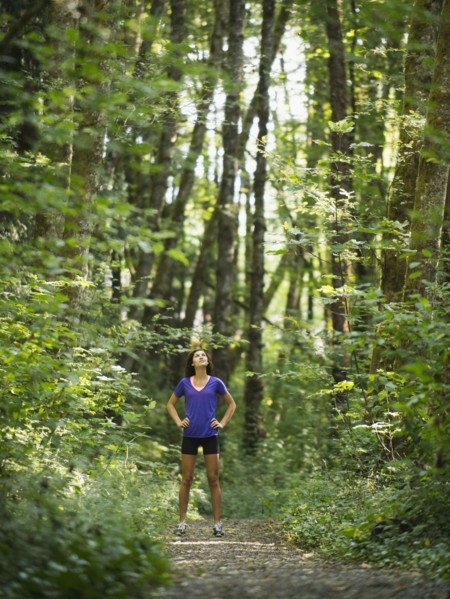 Young women resting in forest. USA, Oregon, Portland.