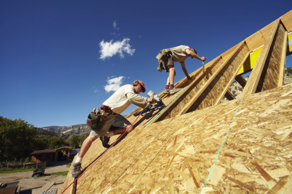 Construction workers working on construction site. USA, Colorado.
Photo : Kelly