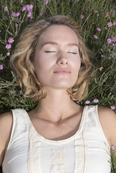 Woman relaxing on meadow.
Photo : Jan Scherders