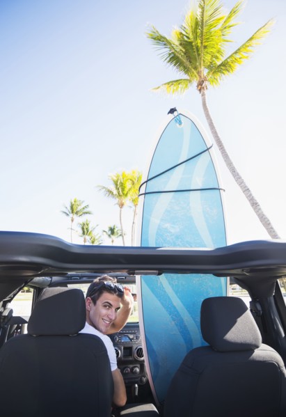 Young man sitting inside car. Jupiter, Florida, USA.
Photo : Daniel Grill