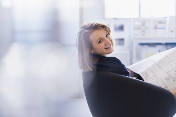 Portrait of smiling business woman in office.