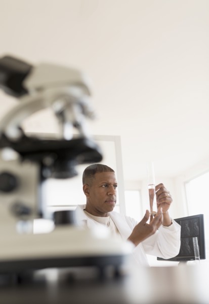 Male technician working in laboratory.