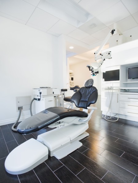 Empty dentist's office with modern equipment.