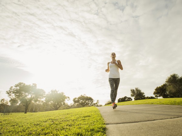 Woman running in park.