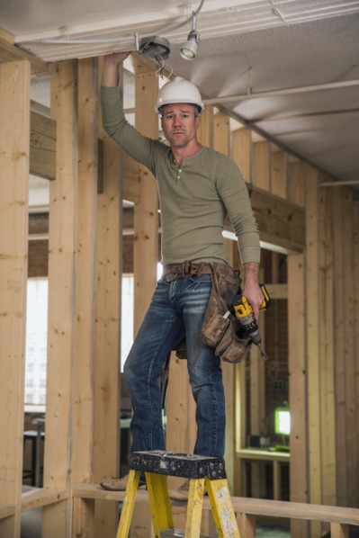 Businessman wearing cowboy hat