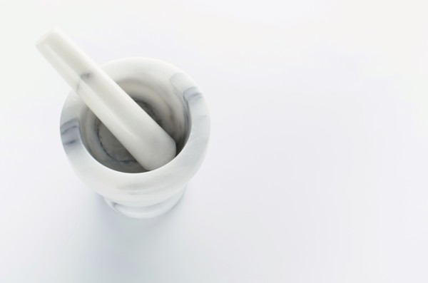 Studio shot of mortar and pestle.
Photo : Tetra Images