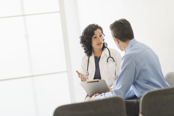 Doctor talking to patient.