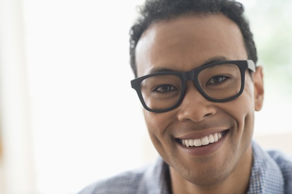 Portrait of young man smiling.