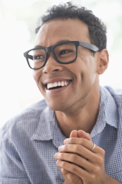Portrait of young man smiling.
