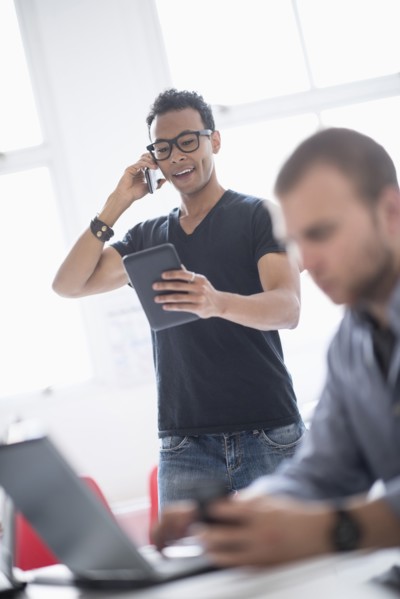 Men working in office.