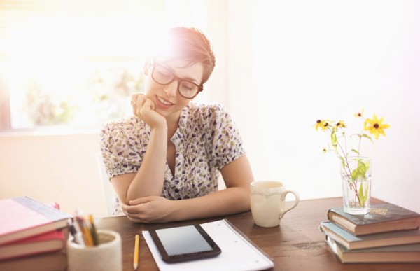 Young woman working in home office.