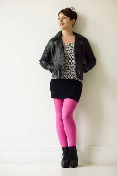 Young woman wearing pink stockings.