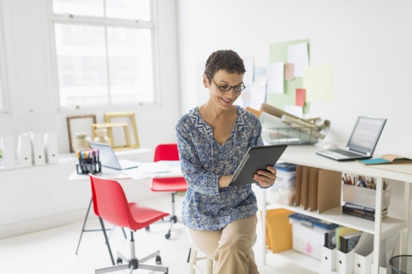 Woman working in home office.