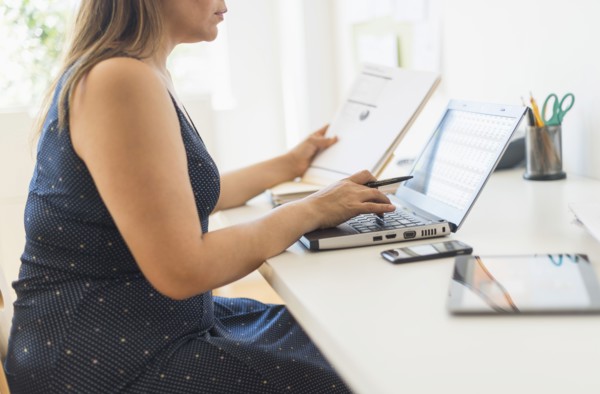 Woman working in home office.