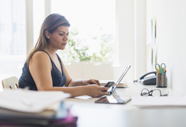 Woman working in home office.