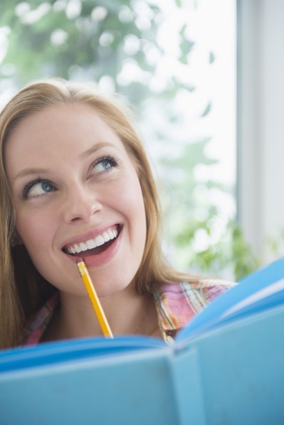 Portrait of young woman planning